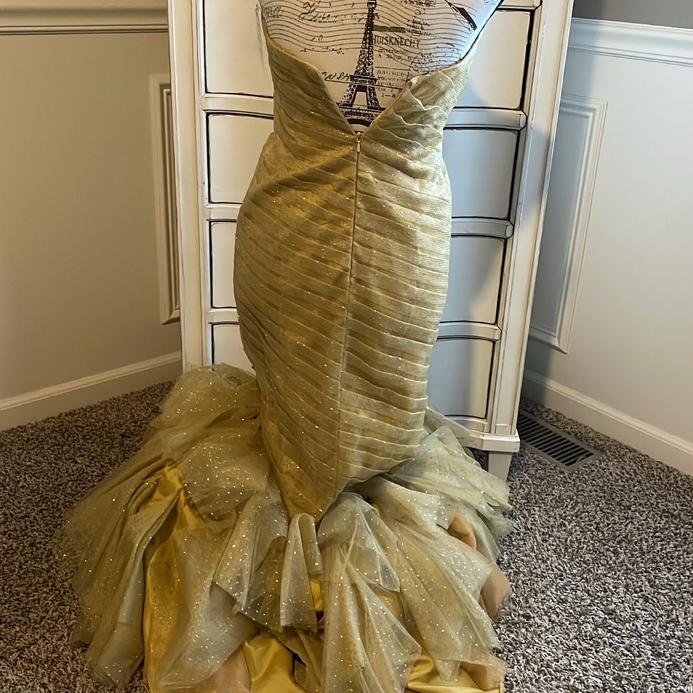 Gold strapless mermaid-style formal gown with a ruffled tulle skirting - Picture 8 of 11